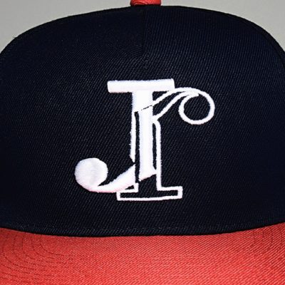 Jean-Jacques snapback logo on blue and red cap with white lettering